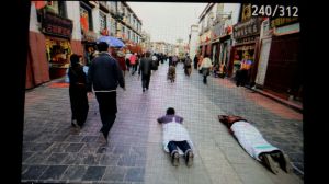 Prostrating worshippers on the way to Jokhang temple.